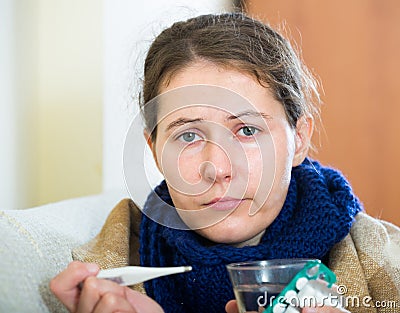 Female having heavy quinsy Stock Photo