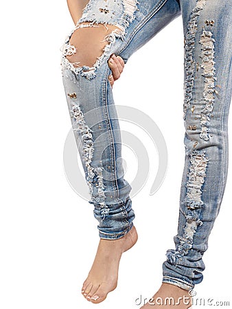 Female having sprain problems, holding her painful leg. Stock Photo