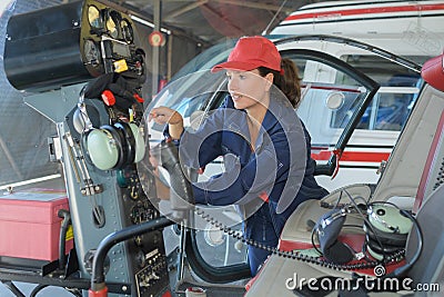 Female helicopter mechanic at work Stock Photo