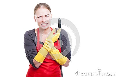 Female housekeeper suffering from rheumatism Stock Photo