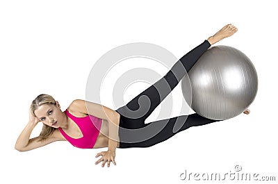 Female instructor at stretching pilates exercises with finess ba Stock Photo