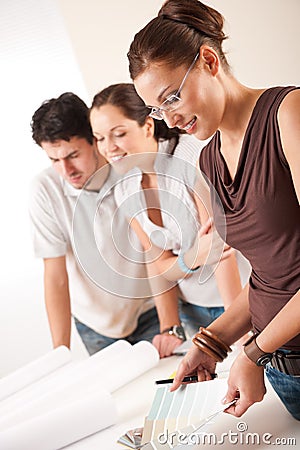 Female interior designer with two clients Stock Photo