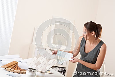 Female interior designer working at office Stock Photo