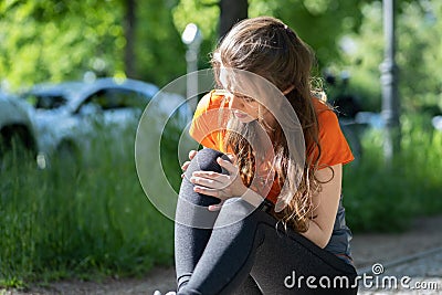 Female Jogger Having Pain Stock Photo