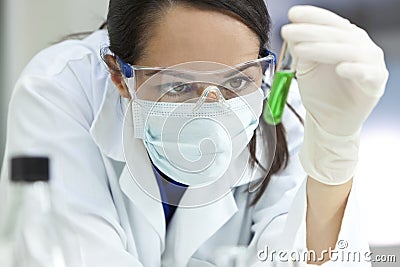 Female Laboratory Scientist Doctor Green Test Tube Stock Photo