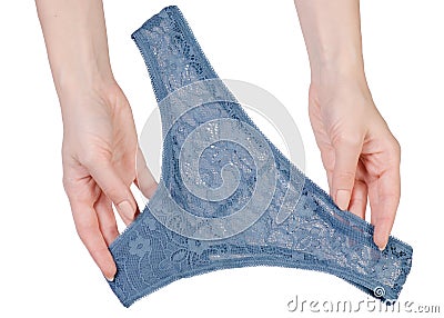 Female lace blue panties in hand Stock Photo