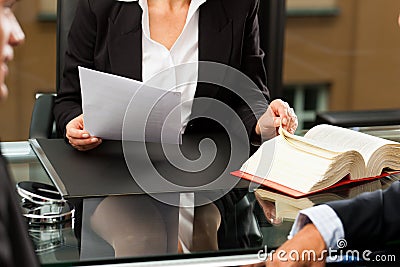 Female Lawyer or notary in her office Stock Photo