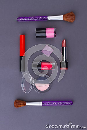 Female layout items on a dark surface. Stock Photo