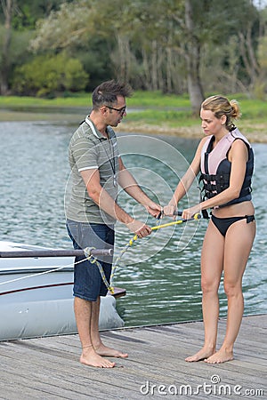 Female learning to waterskiing Stock Photo