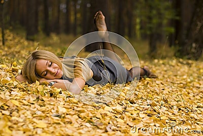 Female on leaves Stock Photo