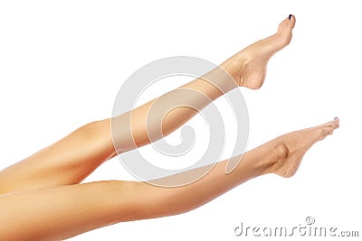 Female legs after depilation. Healthcare, foot care, rutine treatment. Spa and epilation. Feet with clean smooth skin. Stock Photo