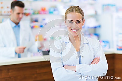 Female and male pharmacists Stock Photo