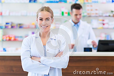 Female and male pharmacists Stock Photo