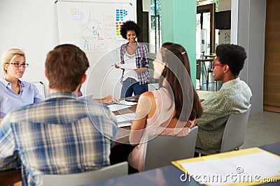 Female Manager Leading Brainstorming Meeting In Office Stock Photo