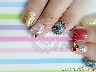 Female manicure. Steep and very stylish design of manicure. Colorful nails Stock Photo