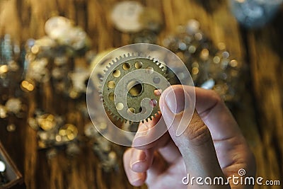 Female master works in her workshop Stock Photo