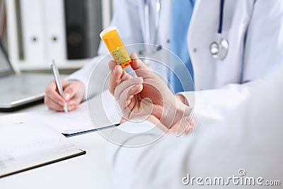 Female medicine doctor write prescription Stock Photo