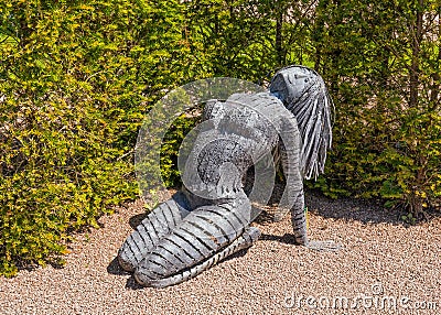 Female Metal Sculpture, Hampton Court, Herefordshire, England. Editorial Stock Photo