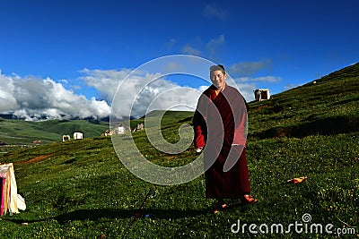 Female Monk in Tibet Editorial Stock Photo