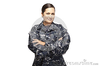 Female in navy uniform with arms crossed Stock Photo