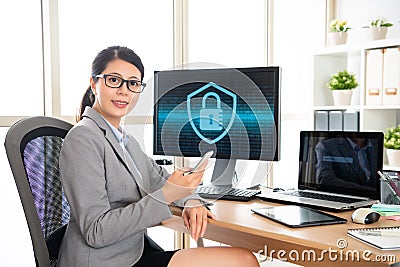 Female office worker contacting customers Stock Photo