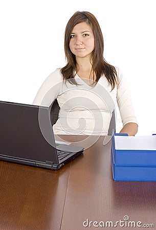 Female office worker at the desk Stock Photo