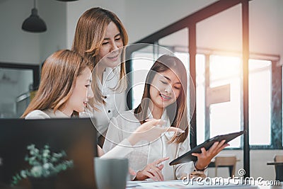 Female operations manager holds meeting presentation for a team of economists Stock Photo