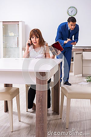 Female owner and male police officer in housebreaking concept Stock Photo