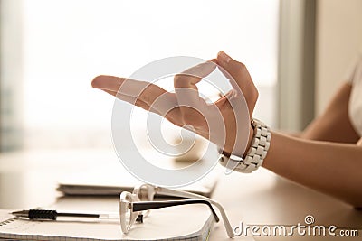 Female palm with fingers folded in Jnana mudra gesture Stock Photo