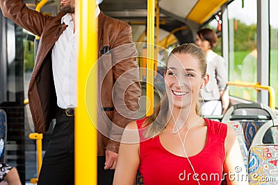 Female passenger in a bus Stock Photo