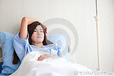 Female patient being treated in hospital Stock Photo