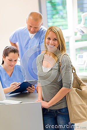 Female patient coming to dental surgery Stock Photo