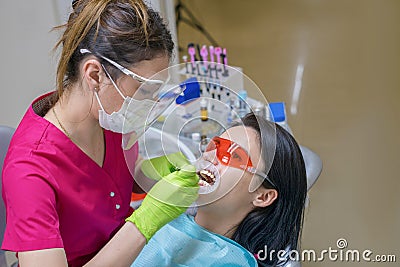 Female patient at dentist in the clinic Stock Photo