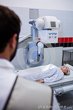 Female patient going through x-ray test Stock Photo