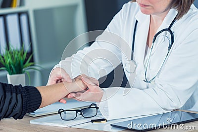 Female patient at orthopedic doctor medical exam for wrist injur Stock Photo