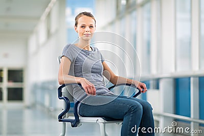 Female patient, sitting in a wheelchair for patients Stock Photo