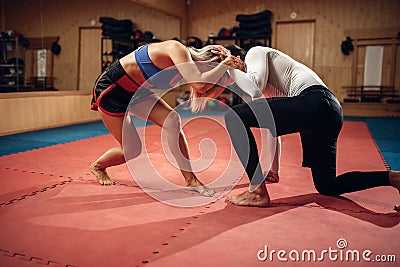 Female person holds the grip, self defense workout Stock Photo