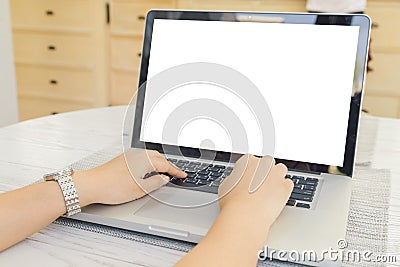 Female person sitting front open laptop computer and smart phone with blank empty screen for your information or content. Stock Photo