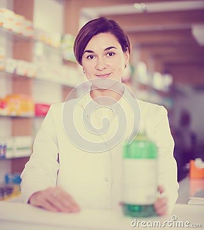 Female pharmacist demonstrating assortment of pharmacy Stock Photo