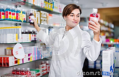 Female pharmacist suggesting useful body care products Stock Photo