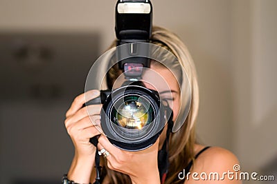 Female photographer. Stock Photo