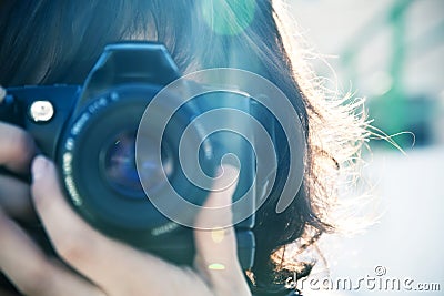 Female photographer. Stock Photo