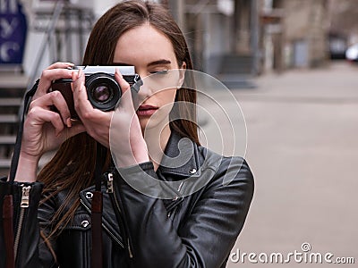 Female photographer. Old school electronics Stock Photo