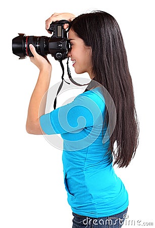 Female Photographer Shooting Someone or Something Stock Photo