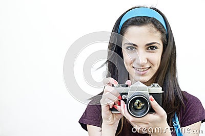Female photographer taking shots Stock Photo