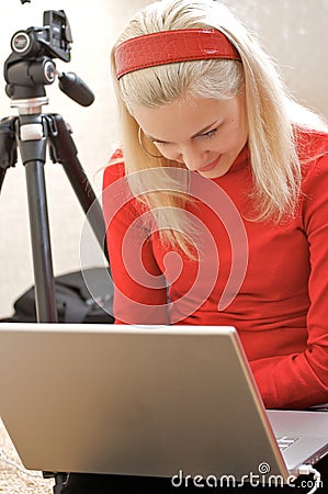 Female Photographer w/ laptop Stock Photo