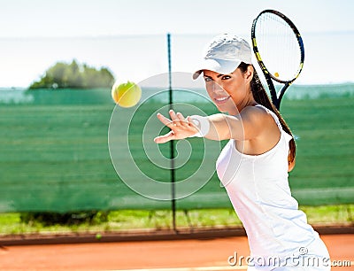 Female playing tennis Stock Photo