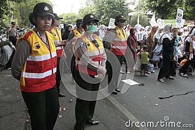 Female police guard rallies in Surakarta Editorial Stock Photo