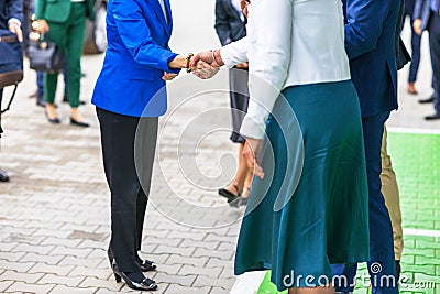 Female politicians or business persons welcome handshake before meeting Stock Photo