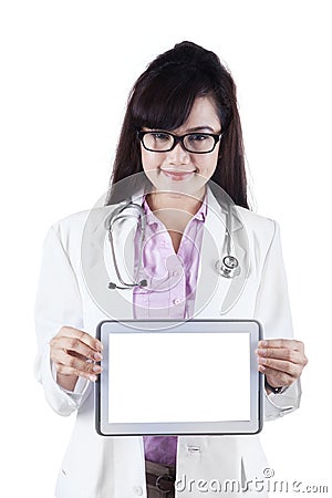 Female practitioner showing digital tablet Stock Photo